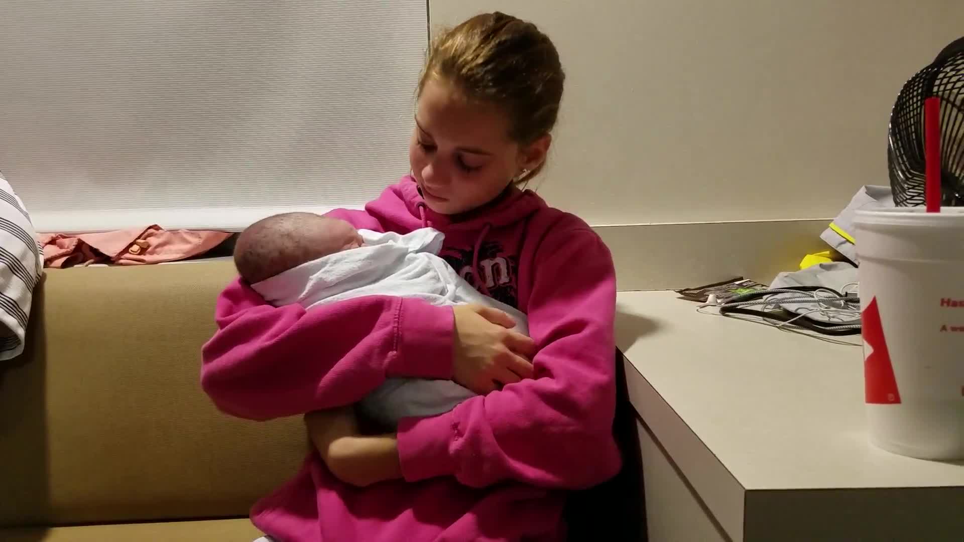 Emotional Big Sister Holds Baby Brother For The First Time.