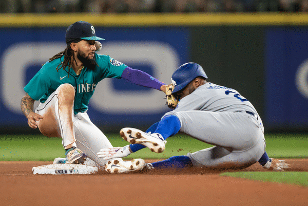 Dodgers clinch 2023 NL West title with 6-2 extra-inning win against Mariners