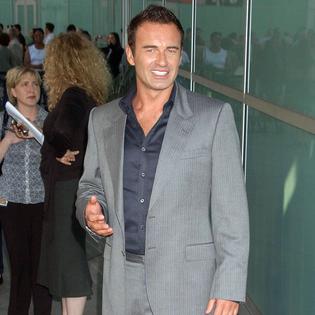 Bang Showbiz / Nicolas Cage has heaped praise on Julian McMahon.