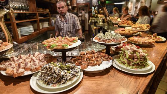 In cities like San Sebastián, bars offer plenty of pintxos– the Basque Country’s version of tapas. (Cameron Hewitt, Rick Steves’ Europe)