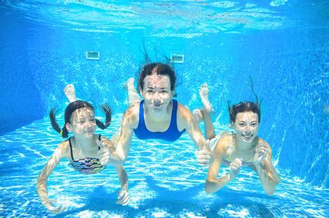 Kids in pool. Dreamstime/TCA