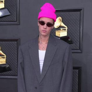 Bang Showbiz / Scooter Braun has praised Justin Bieber's new album