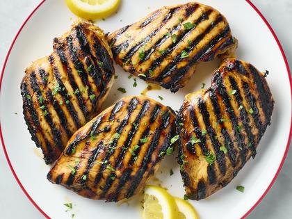 Learn key steps to really juicy grilled chicken, from pounding the chicken, making a marinade, and achieving great grill marks. (Alex Lepe/TCA)