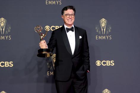 LOS ANGELES, CALIFORNIA - SEPTEMBER 19: Stephen Colbert, winner of the Outstanding Variety Special (Live) award for 'Stephen Colbert's Election Night 2020: Democracy's Last Stand Building Back America Great Again Better 2020,' poses in the press room during the 73rd Primetime Emmy Awards at L.A. LIVE on September 19, 2021 in Los Angeles, California. (Photo by Rich Fury/Getty Images)