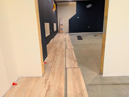 The staggered pieces of LVP will be snapped into position in less than 30 seconds per piece. If you can fog a mirror, you can install LVP. (Tim Carter/Tribune Content Agency). TNS