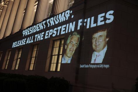 An image of U.S. President Donald Trump and Jeffrey Epstein, along with the words “President Trump: Release All the Epstein Files,
