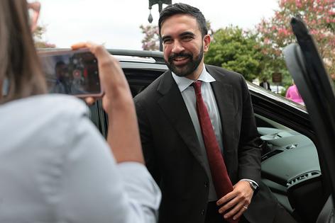 WASHINGTON, DC - JULY 16: NYC Mayoral Candidate Zohran Mamdani briefly speaks with reporters as he leaves the Dirksen Senate Office Building on July 16, 2025 in Washington, DC. Zohran met privately with Sanders after attending a breakfast event hosted by Rep. Alexandria Ocasio-Cortez (D-N.Y.) He is expected to meet House Minority Leader Rep. Hakeem Jeffries (D-NY), who has yet to endorse later this week.  (Photo by Michael M. Santiago/Getty Images)