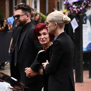Bang Showbiz / Sharon Osbourne was visibly distraught as she viewed the many flowers and tributes to her late husband Ozzy Osbourne
