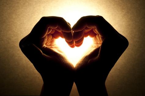 Hands in shape of heart signifying love. Dreamstime/TCA