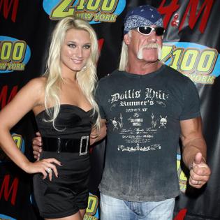 Bang Showbiz / Brooke Hogan has publicly threatened legal action against members of her late father Hulk Hogan's inner circle.