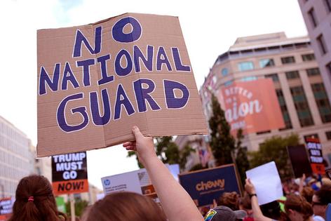 WASHINGTON, DC - AUGUST 11: People participate in a rally against the Trump Administration's federal takeover of the District of Columbia, outside of the AFL-CIO on August 11, 2025 in Washington, DC. President Trump announced he is placing the DC Metropolitan Police Department under federal control, and will deploy the National Guard to the District in order to assist in crime prevention in the nation’s capital. (Photo by Kevin Dietsch/Getty Images)