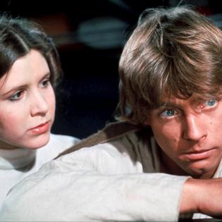 Bang Showbiz / Carrie Fisher as Princess Leia and Mark Hamill as Luke Skywalker in Star Wars: A New Hope.