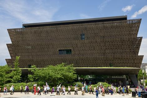 Activists pass the National Museum of African American History and Culture during a march organized by the Freedom to Learn Network in Washington, D.C., on May 3, 2025, calling for the protection of Black history and 