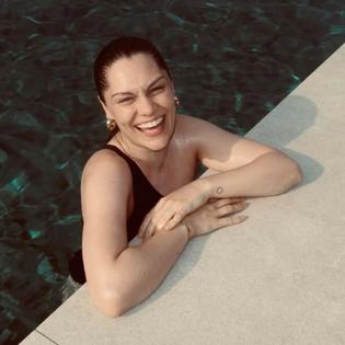 Bang Showbiz / Jessie J has shared joyous photographs of her holiday in Majorca two months after undergoing a mastectomy as part of her treatment for breast cancer