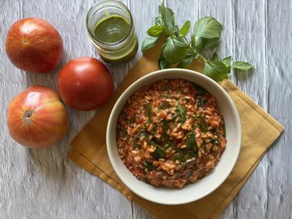 The risotto benefits from a homemade basil oil condiment and a shower of Parmesan. (JeanMarie Brownson/TCA)