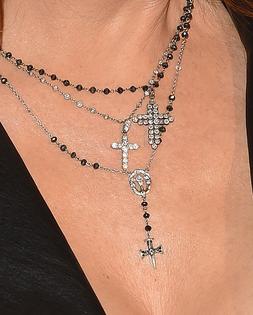 Cross around neck. Getty Images