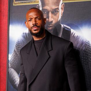 Bang Showbiz / Marlon Wayans has defended Him