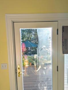 The glass on the left half of the pane was cleaned in less than 30 seconds. It’s crystal clear, in contrast to the fogged glass on the right side. (Tim Carter/TNS)