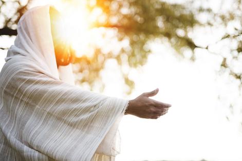 Jesus Christ landing a hand for help/. Dreamstime/TCA