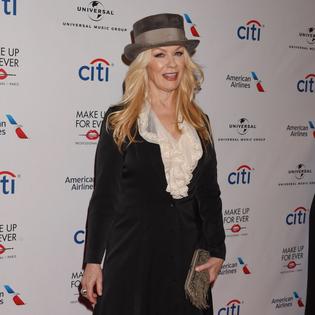 Bang Showbiz / Nancy Wilson says she and sister and Heart bandmate Ann 'took no prisoners' as females in the male-dominated music industry