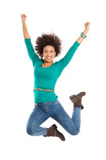 Portrait Of Girl Jumping In Joy Isolated Over White Background. Dreamstime/TCA