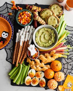 This snack board works as an appetizer for your party or an easy meal to serve before trick or treating. (Joe Lingeman/TCA)
