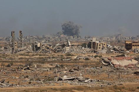 Smoke billows following an Israeli strike in Gaza City, on October 2, 2025, as pictured from Nuseirat in central Gaza, amid the ongoing conflict between Israel and the Palestinian militant group Hamas. (Photo by Omar AL-QATTAA / AFP) (Photo by OMAR AL-QATTAA/AFP via Getty Images)