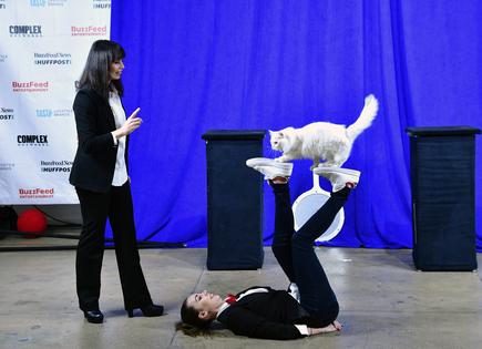 Maryna Savitsky and Svitlana Savitsky and The Savitsky Cats perform during BuzzFeed Inc.'s Listing Day at Nasdaq on Dec. 6, 2021, in New York. (Eugene Gologursky/BuzzFeed Inc./Getty Images/TNS)