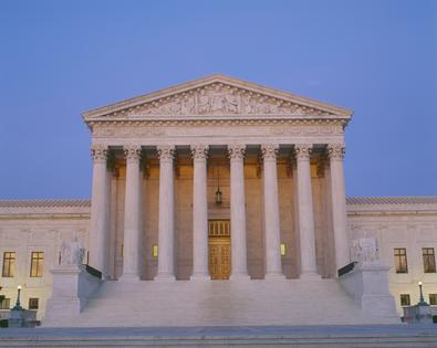 Supreme Court Building at dusk Washington DC. Dreamstime/TCA