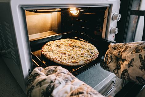 You can still look forward to pizza night. (Dreamstime/TCA)