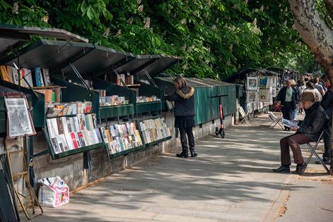 In Paris, “bouquinistes” sell used books and memorabilia from green metal stalls that line the Left Bank of the Seine River. (Cameron Hewitt, Rick Steves’ Europe)