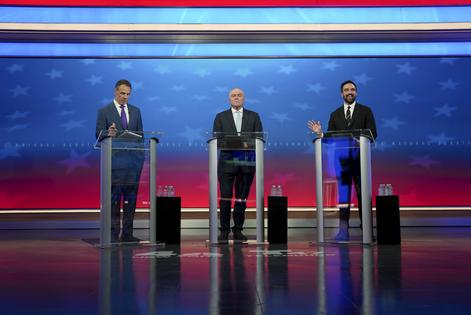 Democratic nominee Zohran Mamdani (R) speaks alongside Independent nominee former New York Gov. Andrew Cuomo (L) and Republican nominee Curtis Sliwa during a mayoral debate at Rockefeller Center on Oct. 16, 2025 in New York City. The candidates for New York City mayor faced off in their first debate ahead of the Nov. 4 election. (Angelina Katsanis-Pool/Getty Images/TCA)