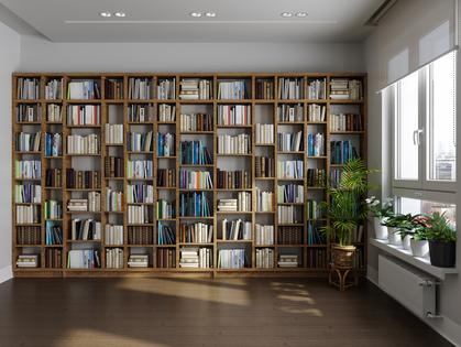 Empty Room With Bookshelf, Potted Plants And Parquet Floor. Getty Images