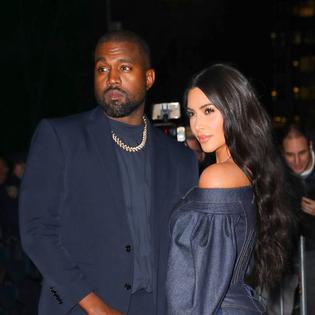Bang Showbiz / Kanye West and Kim Kardashian in happier times