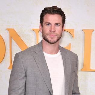 Bang Showbiz / Liam Hemsworth is excited about his engagement news.