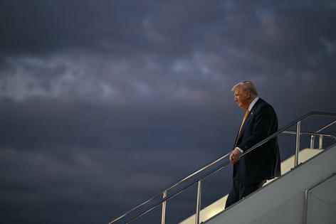 U.S. President Donald Trump alights from Air Force One upon arrival at Haneda Airport in Tokyo on Oct. 27, 2025. (Andrew Caballero-Reynolds/AFP via Getty Images/TCA)