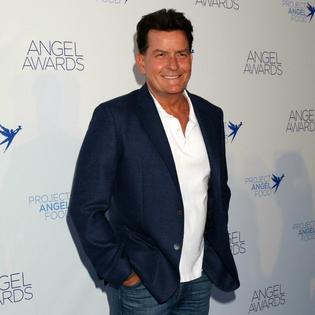 Bang Showbiz / Charlie Sheen has clarified his comments about sexual experiences with men