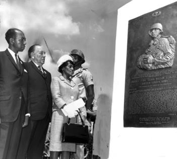 Mayor Daley is flanked by Mr. and Mrs. Milton Lee Olive Jr., parents of the medal of honor winner, at ceremonies on June 19, 1966, unveiling the monument to the memory of Private First Class Milton Lee Olive in a park now known as Olive Park. The monument is sculpted in bronze. Editors note: this historic print has some pencil markings on it. (William Vendetta/Chicago Tribune/TNS)