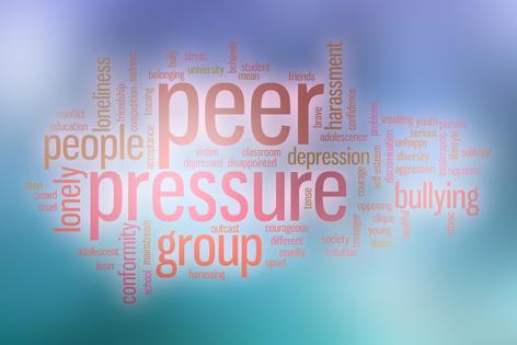 Peer pressure concept. Dreamstime/TCA