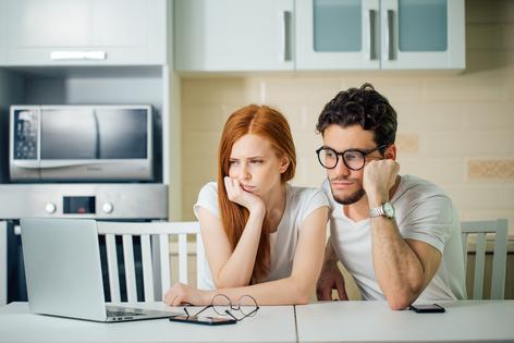 Couple experiencing money troubles. Dreamstime/TCA