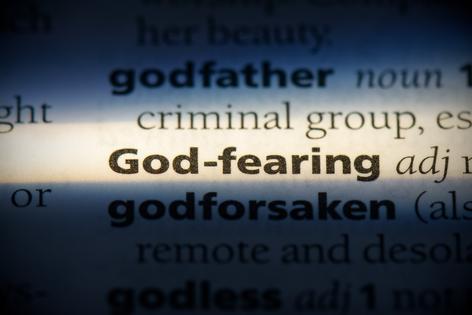 God-fearing in a dictionary. Dreamstime/TCA