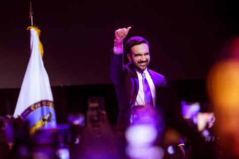 New York City Democratic mayoral candidate Zohran Mamdani celebrates as he takes the stage at his election night watch party at the Brooklyn Paramount on Nov. 4, 2025, in the Brooklyn borough of New York City. Mamdani defeated Independent candidate Andrew Cuomo and Republican candidate Curtis Sliwa in the closely watched election for New York City mayor. (Spencer Platt/Getty Images/TCA)
