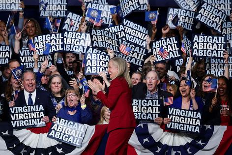 RICHMOND, VIRGINIA - NOVEMBER 04: Virginia Democratic gubernatorial candidate, former Rep. Abigail Spanberger Abigail Spanberger arrives on stage to deliver remarks at her election night watch party at the Greater Richmond Convention Center on November 04, 2025 in Richmond, Virginia. Spanberger defeated Republican gubernatorial candidate Lieutenant Gov. Winsome Earle-Sears to become the first female governor in the commonwealth’s history in an election that was seen as a national political bellwether leading into the midterms. (Photo by Alex Wong/Getty Images)