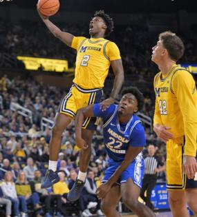 Robin Buckson/The Detroit News/TNS