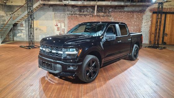 Henry Payne, The Detroit News/The Detroit News/TNS