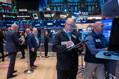 Traders work on the floor of the New York Stock Exchange on Dec. 2, 2025, in New York. (Spencer Platt/Getty Images/TNS)