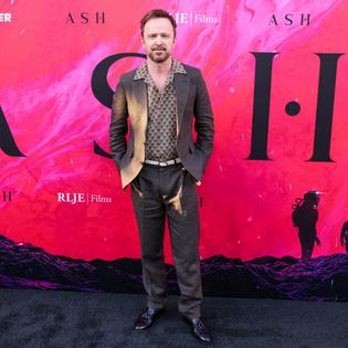 Bang Showbiz / Aaron Paul is loving his new life in Paris.