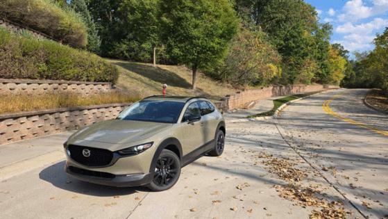 Henry Payne/The Detroit News/TNS