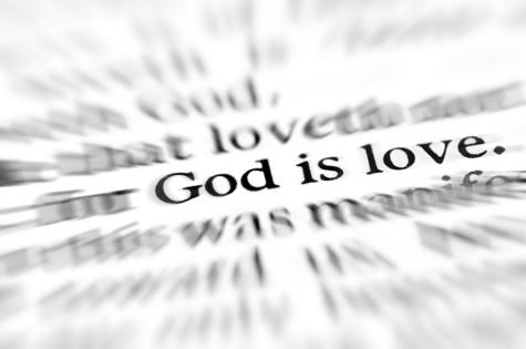 Detail closeup zoom God is love scripture in bible verse. Dreamstime/TCA