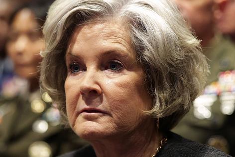 QUANTICO, VIRGINIA - SEPTEMBER 30: White House Chief of Staff Susie Wiles listens as U.S. President Donald Trump speaks to senior military leaders at Marine Corps Base Quantico on September 30, 2025 in Quantico, Virginia. In an unprecedented gathering, almost 800 generals, admirals and their senior enlisted leaders have been ordered into one location from around the world on short notice. (Photo by Alex Wong/Getty Images)